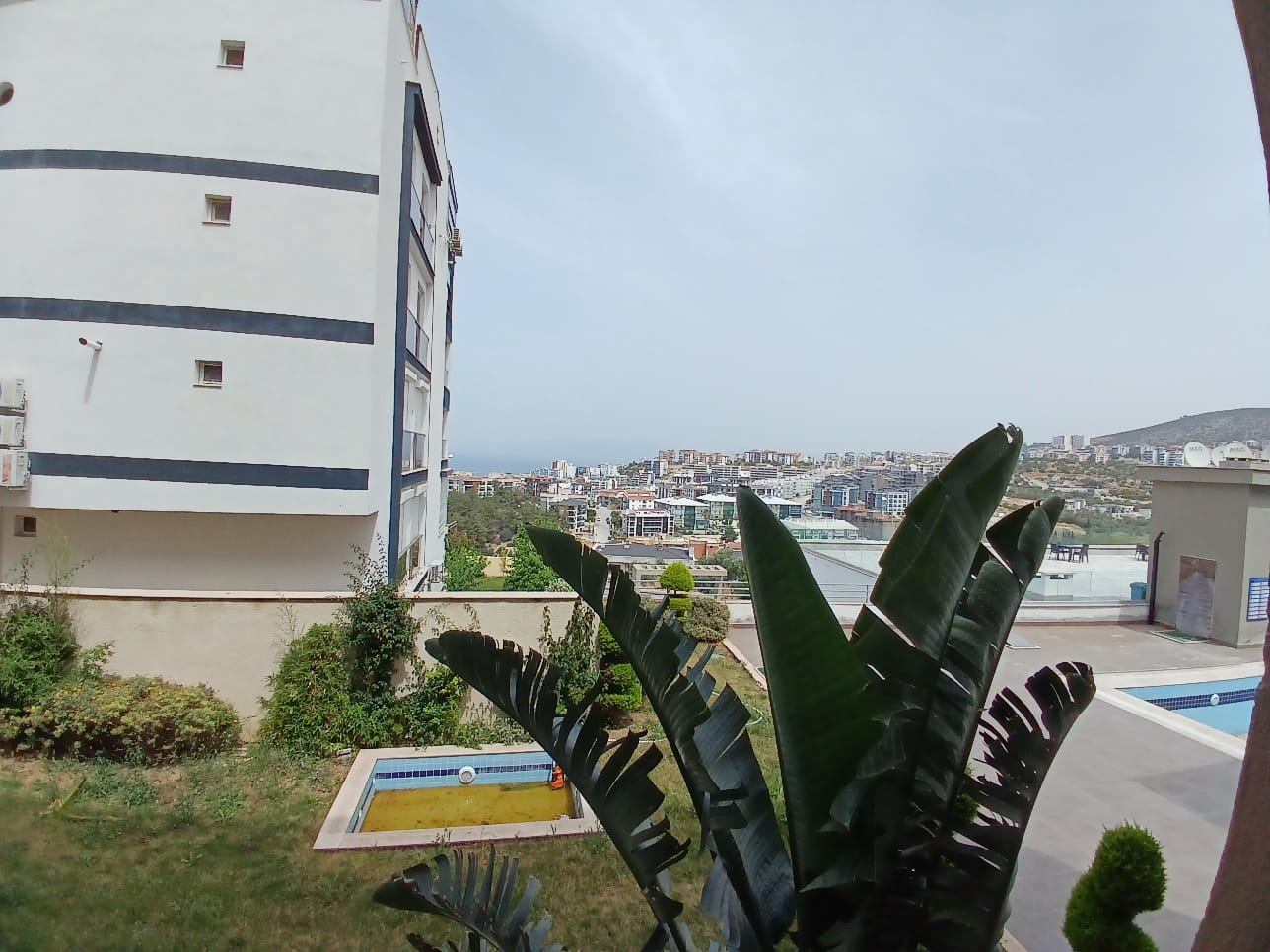 KUŞADASI İKİÇEŞMELİK MAHALLESİNDE KISMİ DENİZ MANZARALI SATILIK 3+1 DAİRE