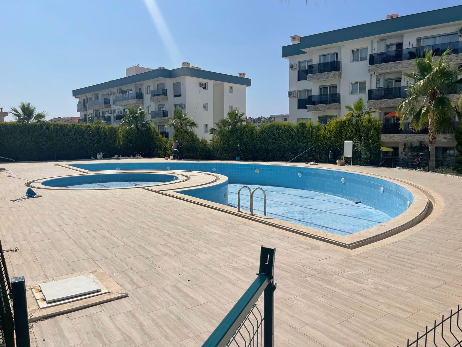 GARDEN FLOOR 2+1 APARTMENT IN KUSADASI CENTER.